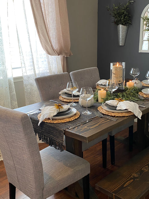 Charger plates on a holiday table setting